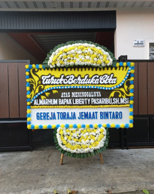 Papan Bunga Duka di Lunto Barat